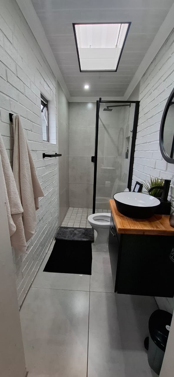 Ensuite bathroom with shower and toilet